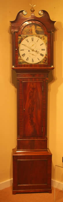 A Scottish , mahogany longcase clock�with an attractive painted dial . The hood , with turned mahogany columns and a swan neck pediment , the Panelled base has single plinth with small bracket feet . The Painted dial is in superb condition and has a painting in the arch of a young Queen Victoria with a cartouche�of Lord Grey and holding a scrolled document with the heading ' Reform ' . This painted arch is (we think) dating the clock to circa 1845 , Lord Grey , Born 1764 , British prime minister 1830 -1834 died in 1845 . The Reform Act of 1832 ( The representation of the people ) and the abolishment of Slavery�throughout the British Empire are what he and his party are remembered for�. Jedburgh was not too far from Howick and the Church where Lord Grey was buried. Lord Grey was also the second Earl Grey for all the Tea lovers reading ! . The movement is fully serviced , of good quality�and strikes the Hour on a bell and runs for a week on a single wind . Walter Rutherford of Jedburgh is Listed in Old Scottish Clockmakers by John Smith - working from 1836 .