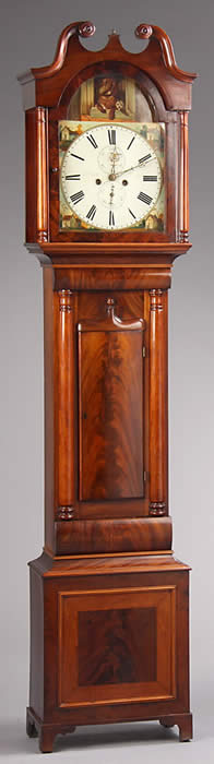 A Scottish flame mahogany longcase clock with classic 'Belly door'�and cushion moulding�above , The hood , with turned mahogany columns and a swan neck pediment , the Panelled base has single plinth with Bracket feet . The Painted dial is in superb condition and has a painting of two dogs to the arch , one a Spaniel the other a Terrior . The movement is of good quality�and strikes the Hour on a bell and runs for a week on a single wind . Charles Howden is Listed in Watch and Clockmakers of the World by B.Loomes - working 1860 . This clock dates Circa 1850. Check out the Youtube video for this clock on our Channel. 