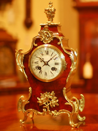 A fine French mantel clock in the classic 'Louis' style�, decorated with ormolu mounts and having an enamel dial showing Roman and arabic numerals . A fine 8 day duration movement with striking on a mellow gong for the Hours and once for the half hours . Made in Paris by Charles Vincenti circa 1895-1900 and bears his stamp on the backplate of the movement and is numbered 35397 . This is a fine example and in exceptional condition.
